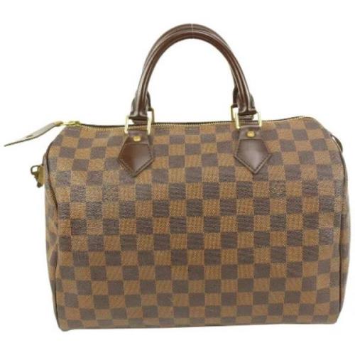 Louis Vuitton Vintage Förägda canvasväskor, tillverkade i Frankrike Br...