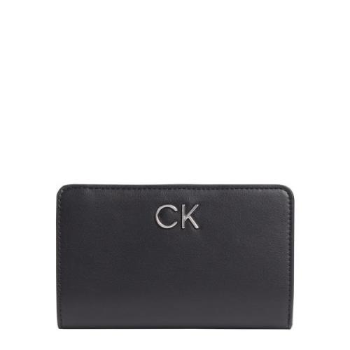 Calvin Klein Fransk plånbok med återlåsning Black, Dam