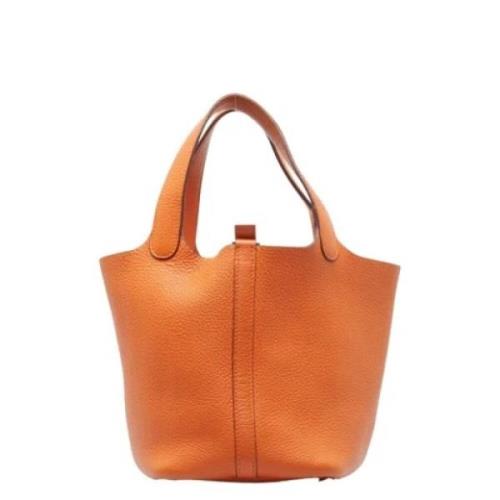 Hermès Vintage Pre-owned Laeder handvskor Orange, Dam