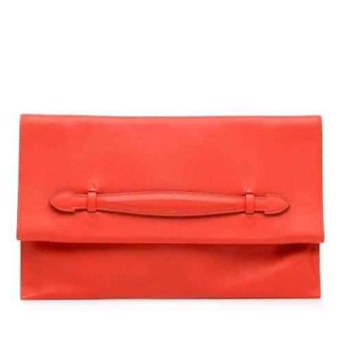 Hermès Vintage Pre-owned Laeder kuvertvskor Orange, Dam