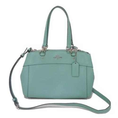Coach Pre-owned Pre-owned Tyg axelremsvskor Green, Dam