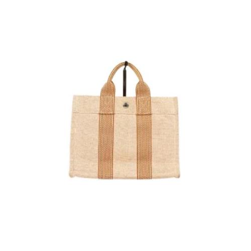 Hermès Vintage Pre-owned Canvas handvskor Beige, Dam