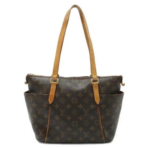 Louis Vuitton Vintage Pre-owned Canvas axelremsvskor Brown, Dam