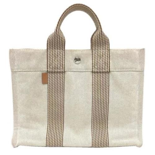 Hermès Vintage Pre-owned Tyg handvskor Beige, Dam