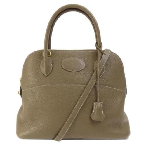 Hermès Vintage Pre-owned Laeder handvskor Beige, Dam