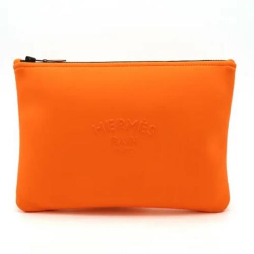 Hermès Vintage Pre-owned Tyg kuvertvskor Orange, Dam