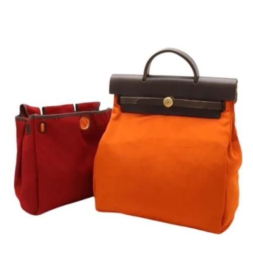 Hermès Vintage Pre-owned Canvas handvskor Orange, Dam