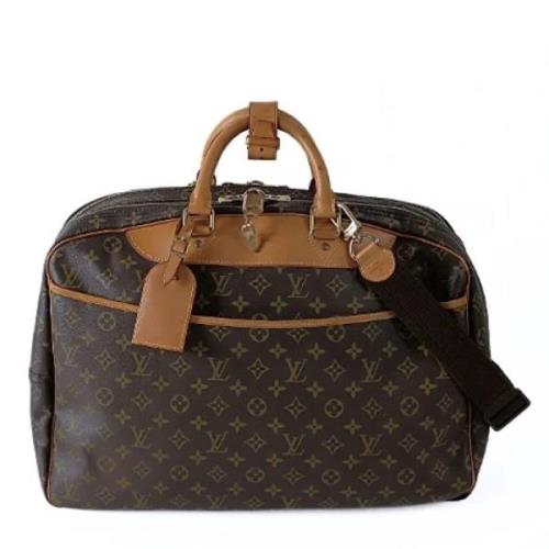 Louis Vuitton Vintage Pre-owned Belagd canvas resvskor Brown, Dam