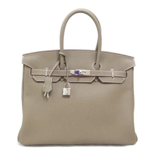 Hermès Vintage Pre-owned Laeder handvskor Beige, Dam