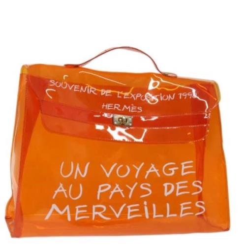 Hermès Vintage Pre-owned Vinyl handvskor Orange, Dam