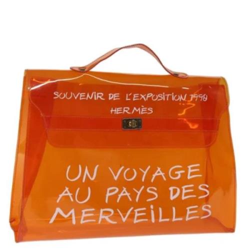 Hermès Vintage Pre-owned Vinyl handvskor Orange, Dam