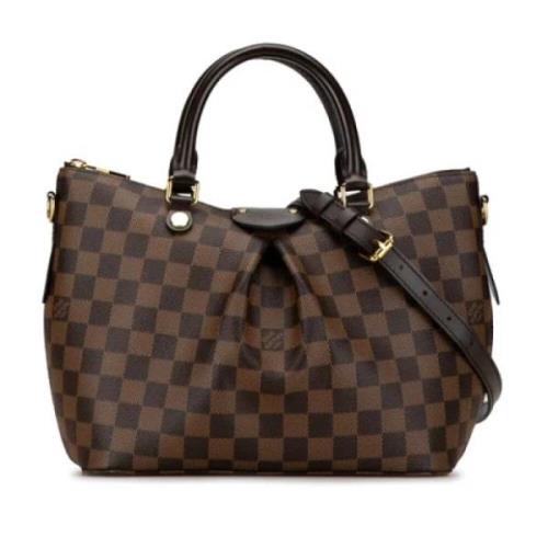 Louis Vuitton Vintage Pre-owned Plast handvskor Brown, Dam