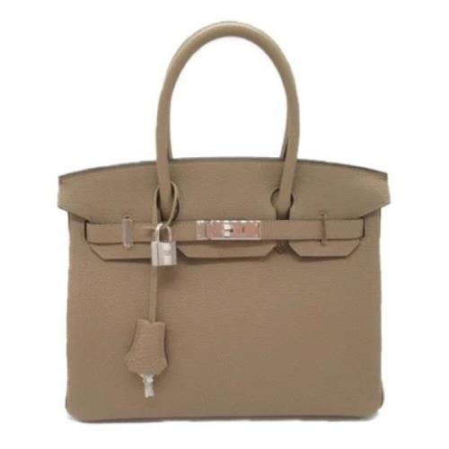 Hermès Vintage Pre-owned Laeder handvskor Beige, Dam