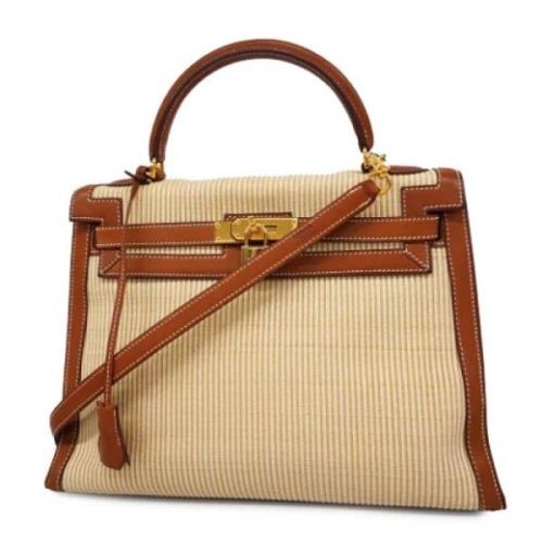 Hermès Vintage Pre-owned Canvas handvskor Beige, Dam