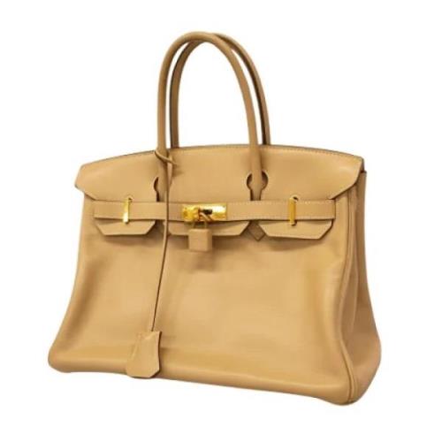 Hermès Vintage Pre-owned Laeder handvskor Beige, Dam