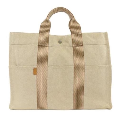 Hermès Vintage Pre-owned Canvas handvskor Beige, Dam