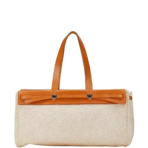 Hermès Vintage Pre-owned Canvas handvskor Beige, Dam