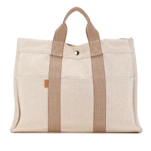 Hermès Vintage Pre-owned Canvas handvskor Beige, Dam