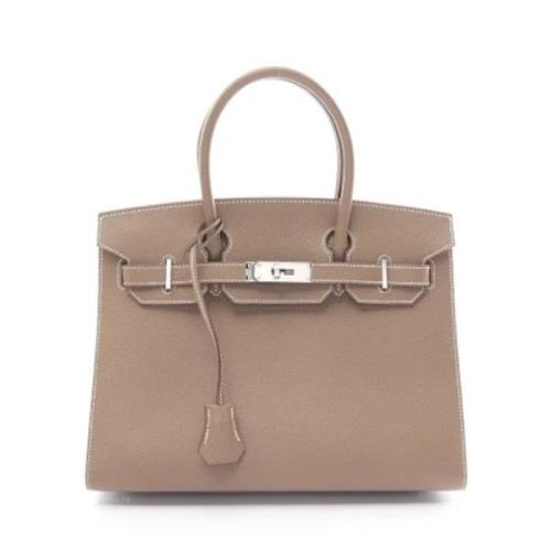 Hermès Vintage Pre-owned Canvas handvskor Beige, Dam