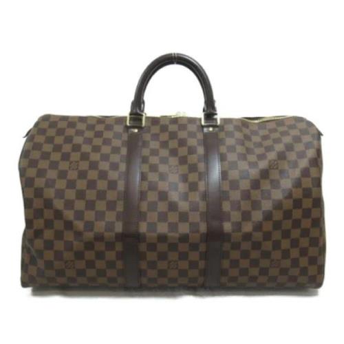 Louis Vuitton Vintage Pre-owned Plast handvskor Brown, Dam