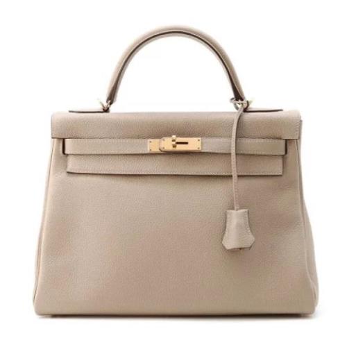 Hermès Vintage Pre-owned Laeder handvskor Beige, Dam