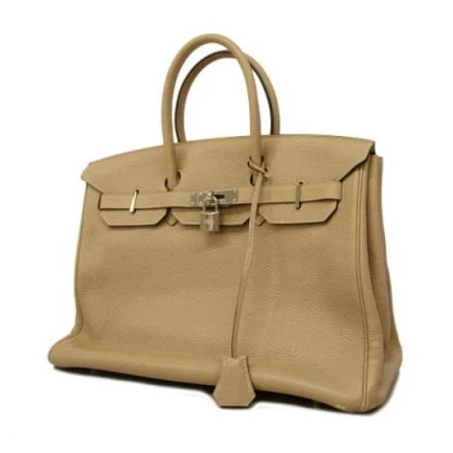 Hermès Vintage Pre-owned Laeder handvskor Beige, Dam