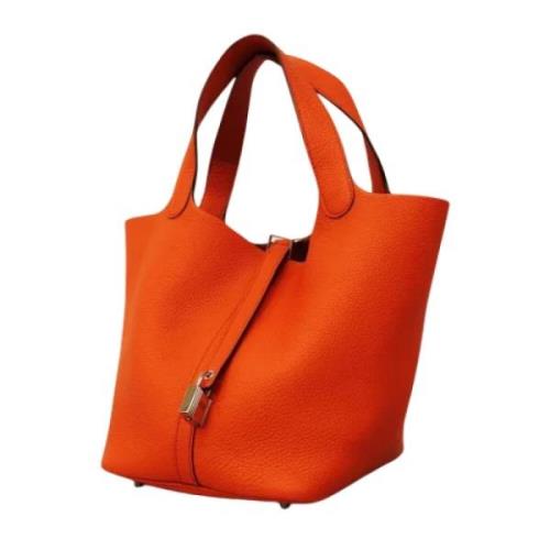 Hermès Vintage Pre-owned Laeder handvskor Orange, Dam