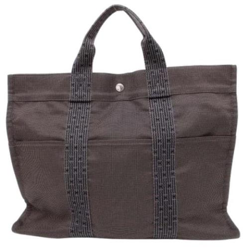 Hermès Vintage Pre-owned Canvas handvskor Gray, Dam