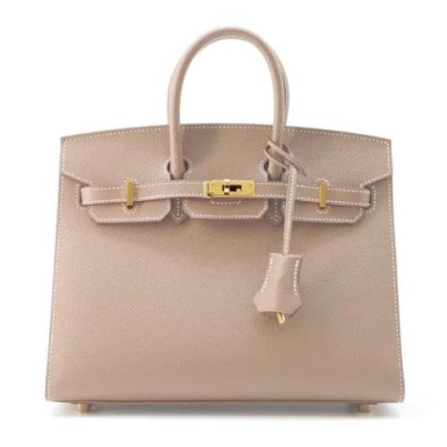 Hermès Vintage Pre-owned Laeder handvskor Beige, Dam