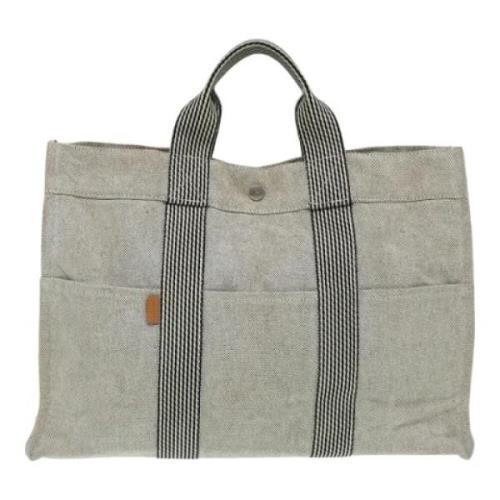 Hermès Vintage Pre-owned Canvas handvskor Gray, Dam