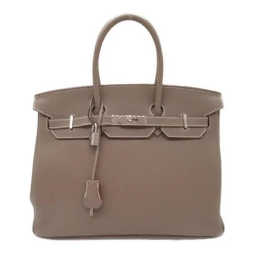 Hermès Vintage Pre-owned Laeder handvskor Beige, Dam