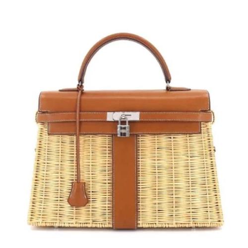 Hermès Vintage Pre-owned Laeder handvskor Beige, Dam