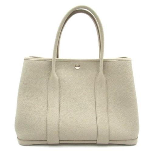 Hermès Vintage Pre-owned Tyg handvskor Beige, Dam