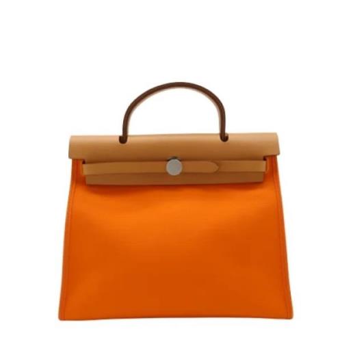 Hermès Vintage Pre-owned Canvas handvskor Orange, Dam