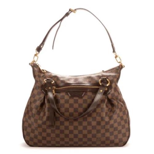 Louis Vuitton Vintage Pre-owned Belagd canvas handvskor Brown, Dam