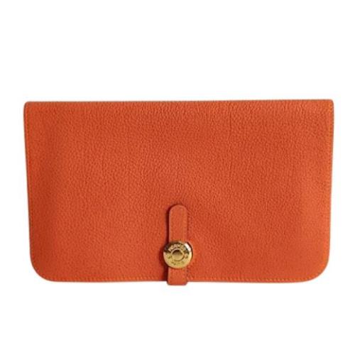 Hermès Vintage Pre-owned Laeder kuvertvskor Orange, Dam