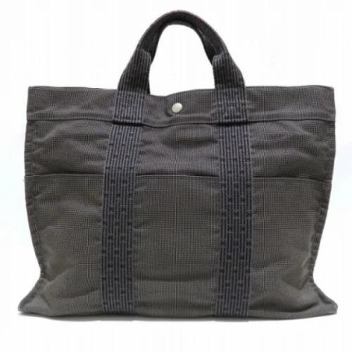 Hermès Vintage Pre-owned Canvas handvskor Gray, Dam