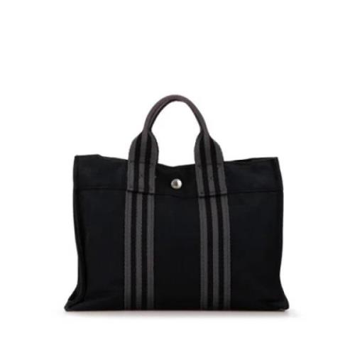 Hermès Vintage Pre-owned Canvas handvskor Black, Dam