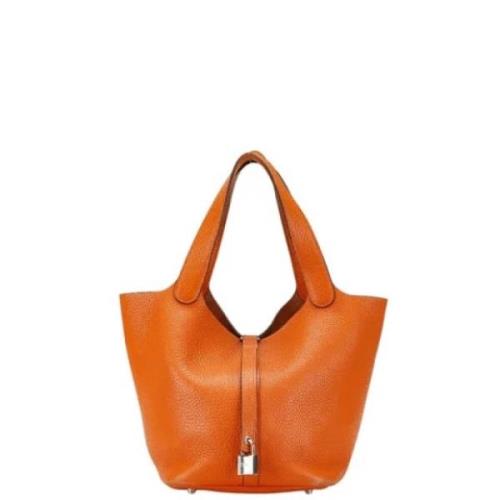 Hermès Vintage Pre-owned Laeder handvskor Orange, Dam