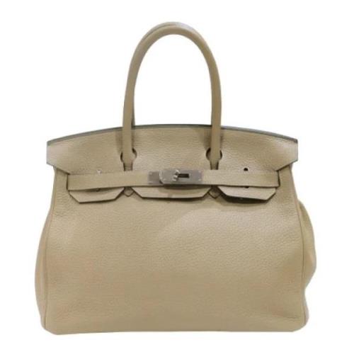 Hermès Vintage Pre-owned Laeder handvskor Beige, Dam